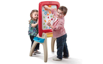 two toddlers playing with the Step2 All Around Easel for Two