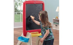 toddler using Step2 All Around Easel For Two